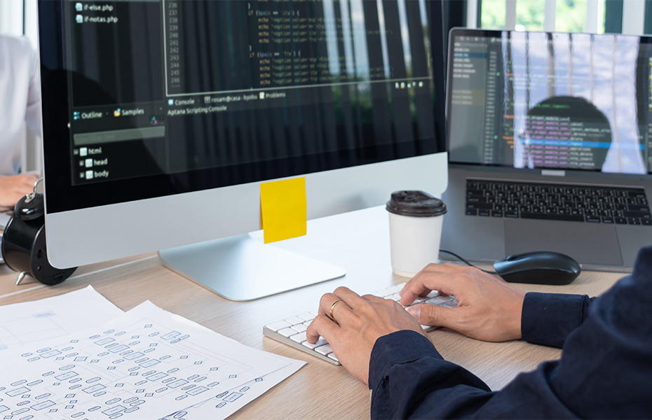 A man working at a computer.