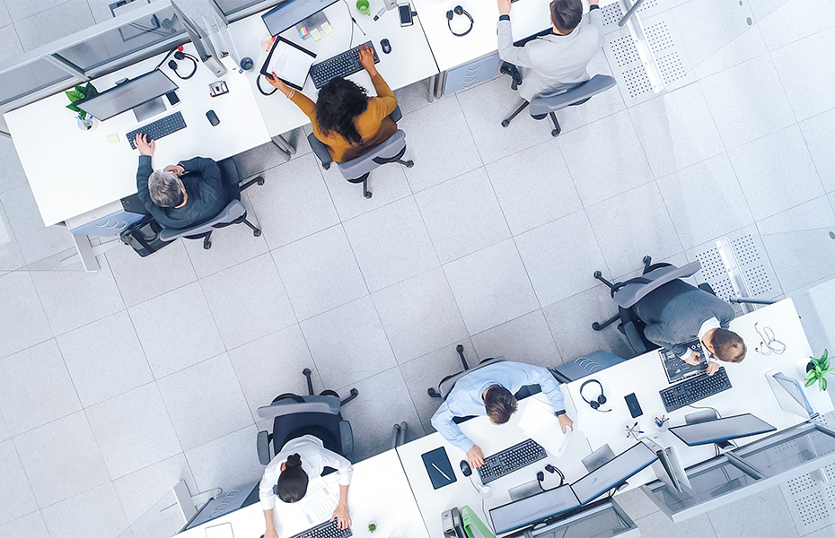 Several people working at desks.