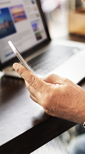 A woman holding a cellphone.