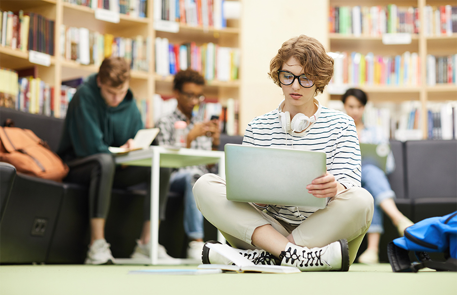 A group of students studying in a library.