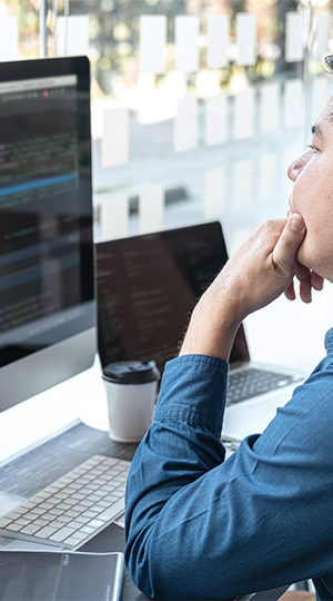 A man working at a computer.