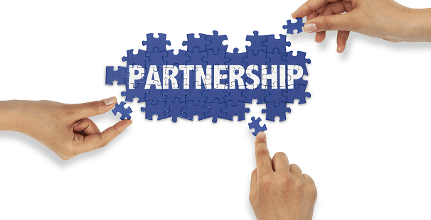 Partnership puzzel being put together
