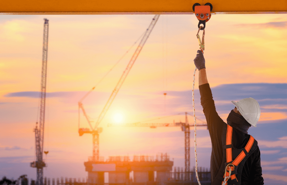 Safety construction worker wearing a safety harness