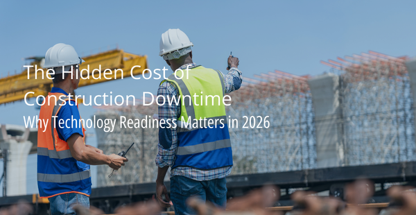 Two construction workers in hard hats and safety vests review information on a tablet at an active construction site with steel framework visible in the background. Text overlay reads: The Hidden Cost of Construction Downtime - Why Technology Readiness Matters in 2026